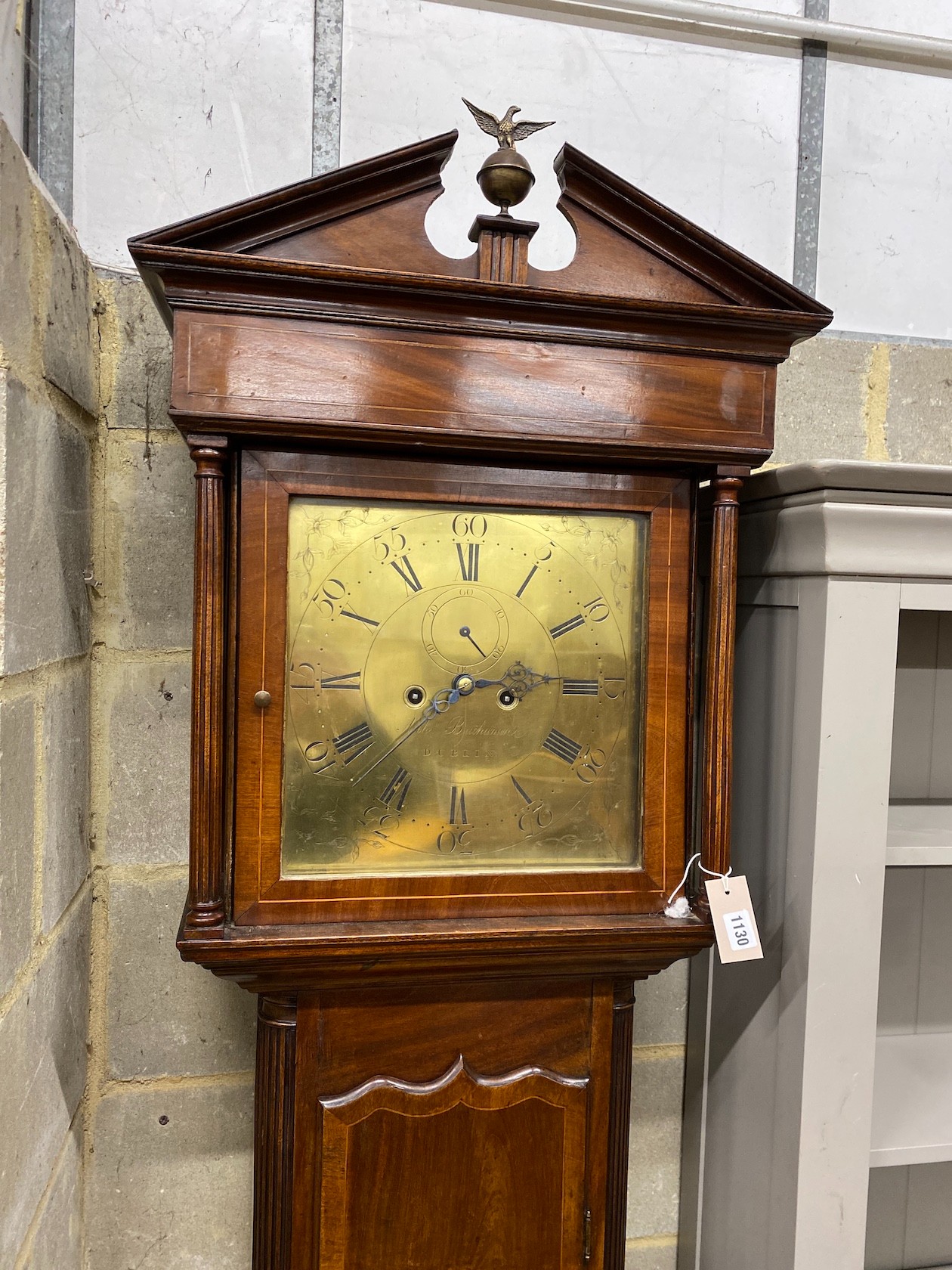 An early 19th century Irish mahogany eight day longcase clock, the square brass dial marked Buchanan, Dublin, height 228cm